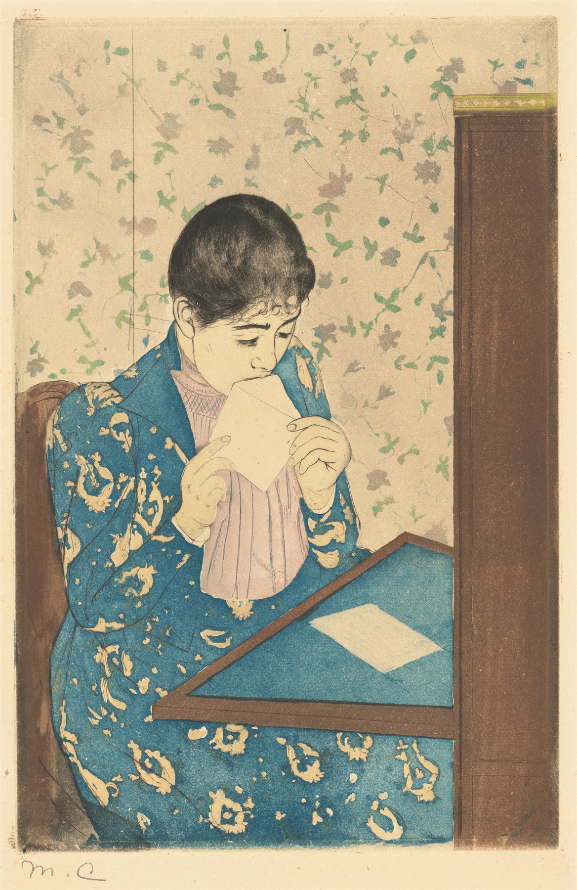 A woman in a blue patterned dress holds an envelope to her mouth at a writing desk, against floral wallpaper.