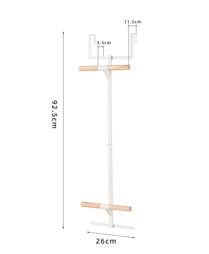 Door mounted rack for shoulder bags