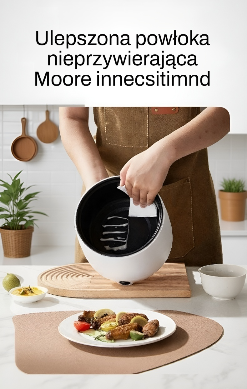 Garnek elektryczny na blacie kuchennym z akcesoriami