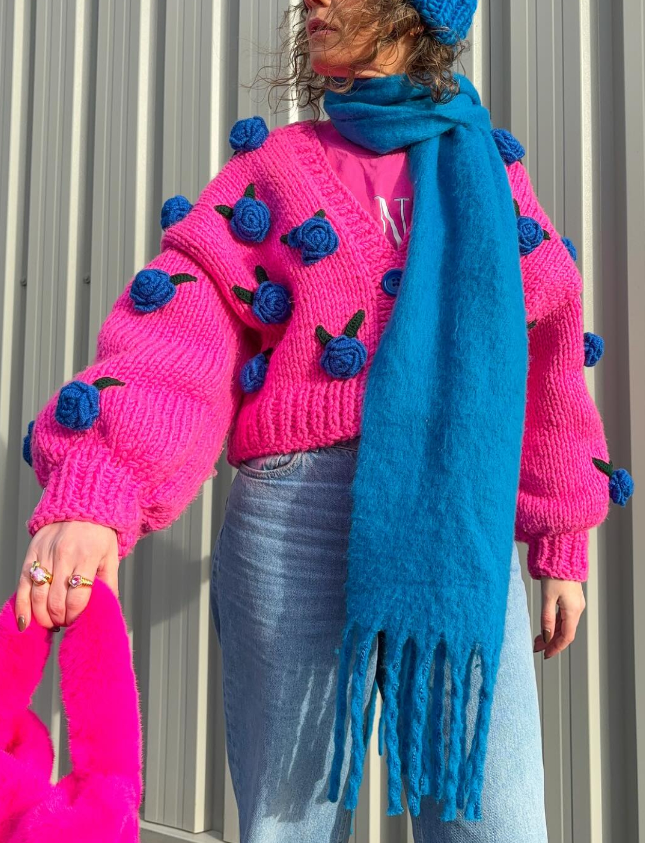 Pink knitted cardigan sweater