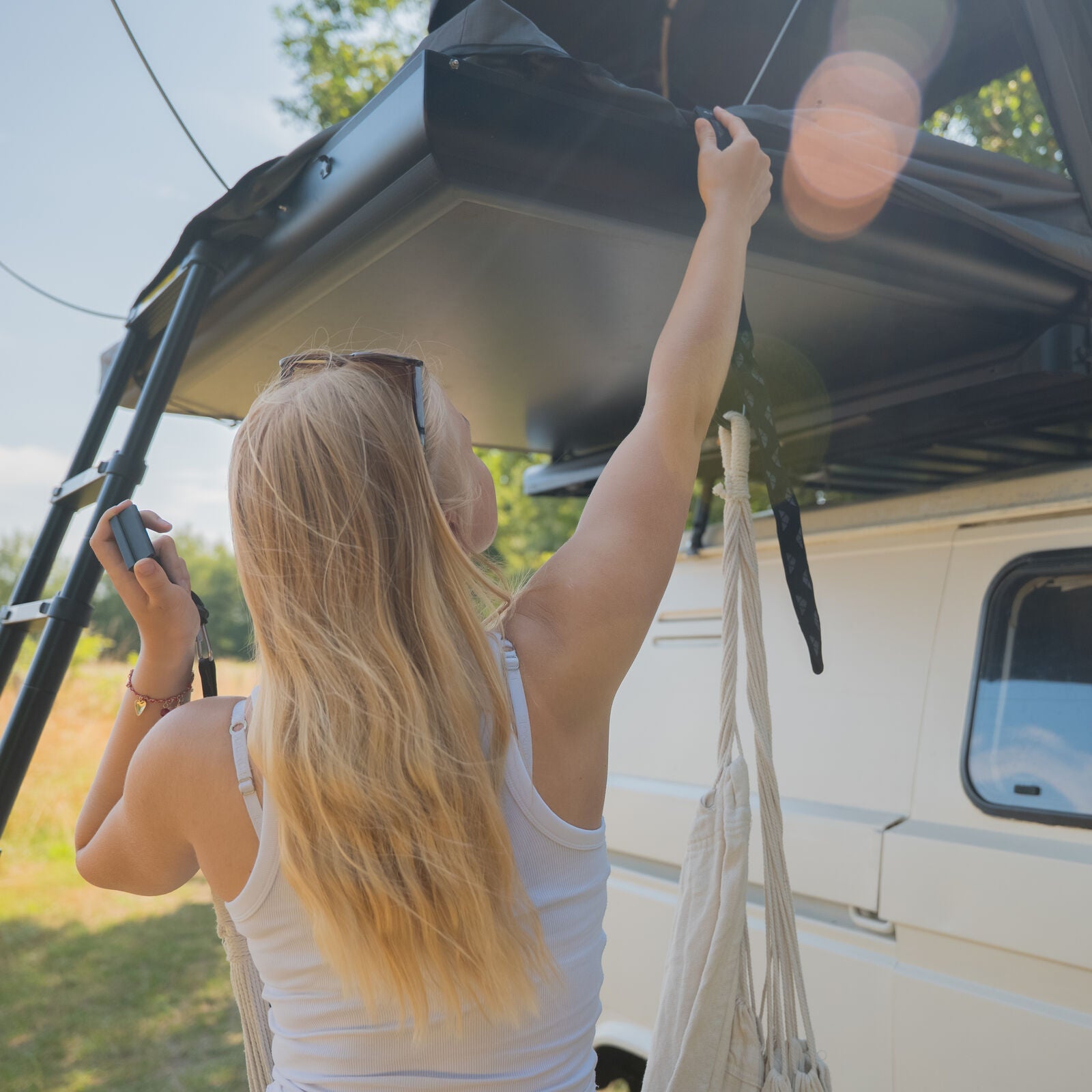 Outdoor rooftop tent hanging chair lifestyle