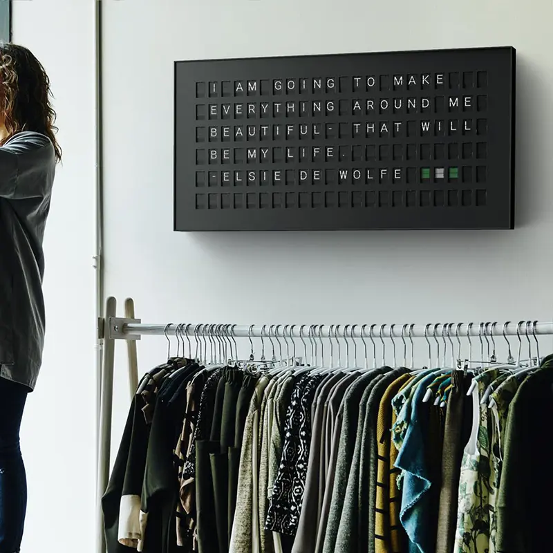 Smart message display presenting an inspirational message in a retail space