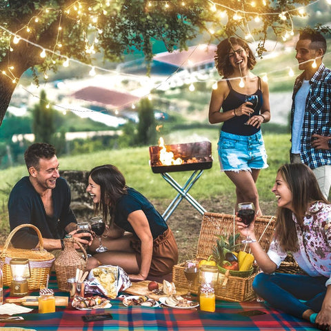 Waterproof Outdoor Picnic Blanket folded on grass