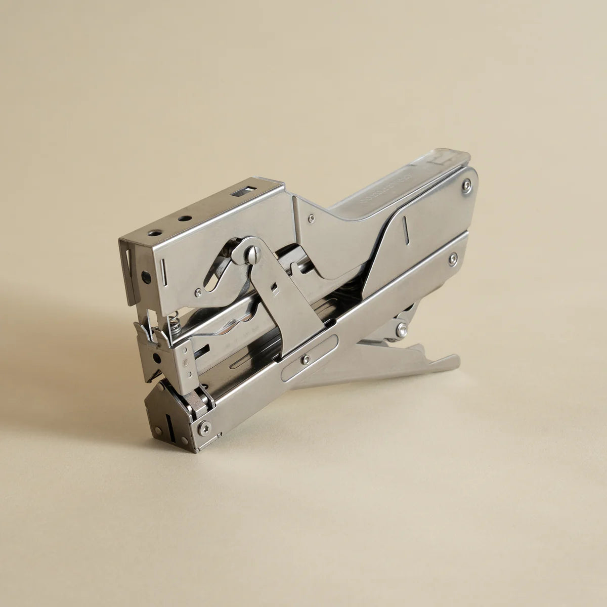 Portable and compact corner nail gun