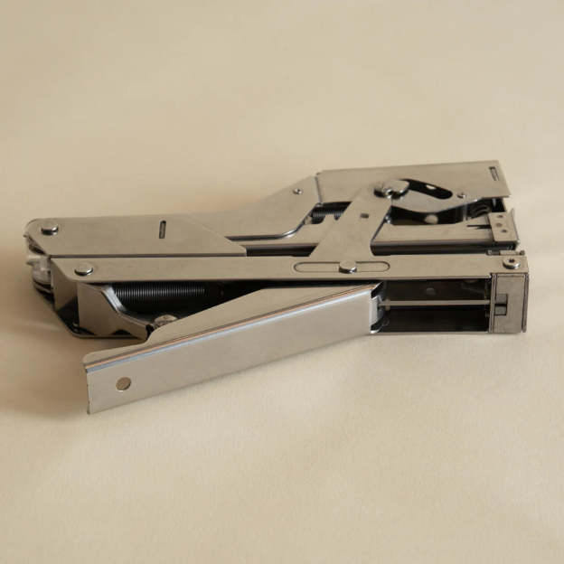 Portable and compact corner nail gun