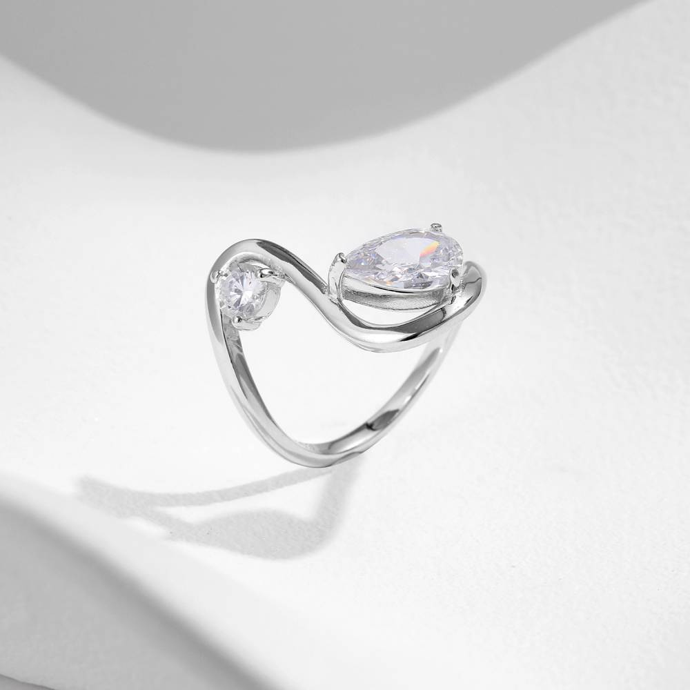 Unique Pear & Round Cut Moissanite Ring