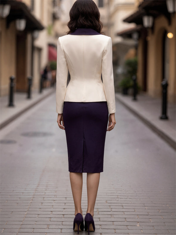 Two-piece suit with cream blazer and dark blue skirt