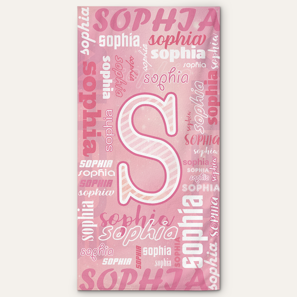Personalized initial and name beach towel with custom monogram letter design for beach and pool use