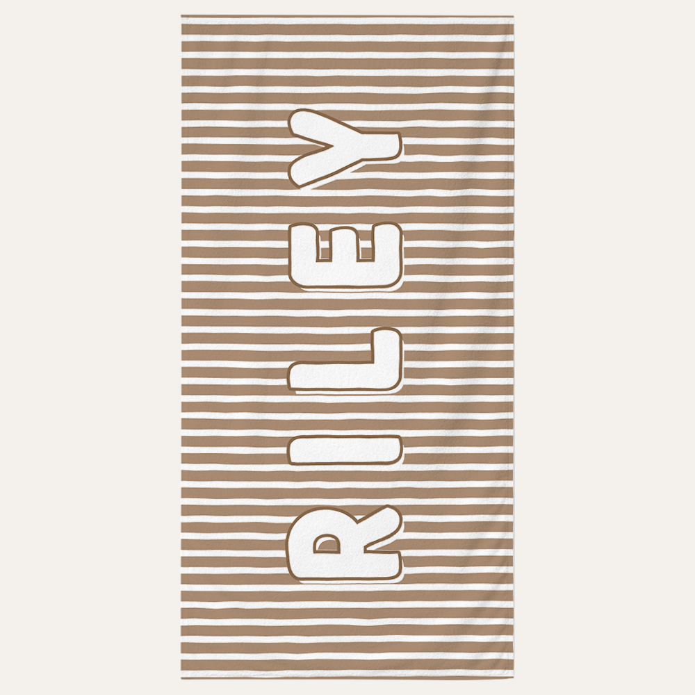 Personalized kids beach towel with custom name on sandy stripe design for beach and pool use