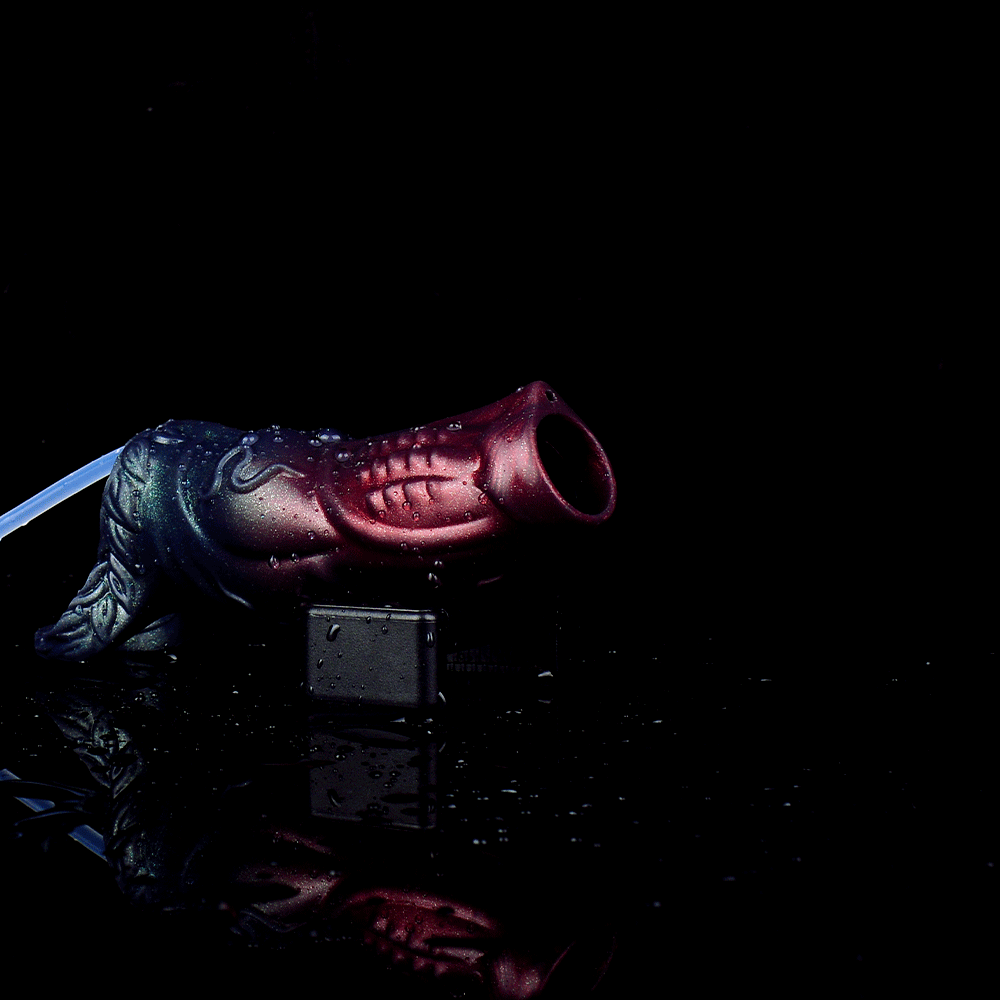 John 5.6" x 2.0" Black Warrior Water Spraying Cock Sleeve