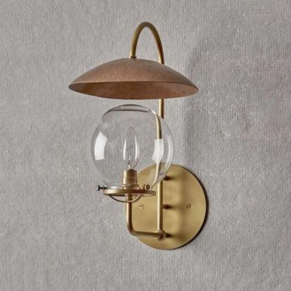 Applique murale Mia en laiton satiné et bronze, abat-jour boule en verre