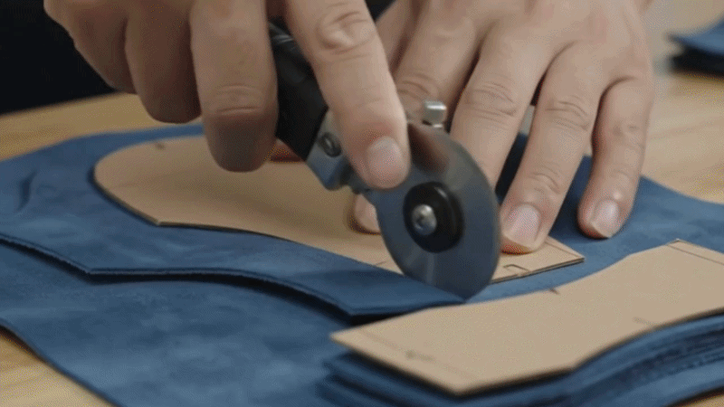 Suggested image: workshop GIF showing material sourcing, fabric cutting, stitching, insole assembly, sole bonding, and final quality inspection