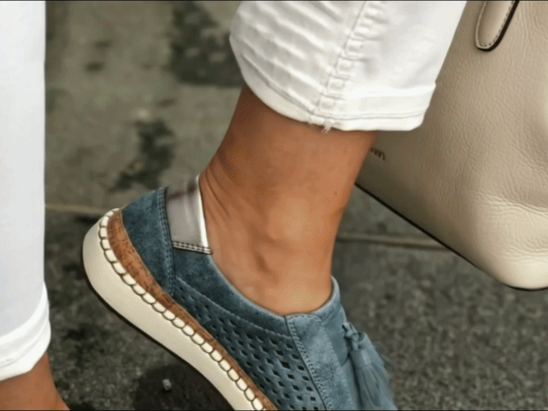 Suggested image: hero GIF of a mature woman leaving home with a handbag, stepping into the Fleet Heritage hollow-out breathable sneakers, walking downstairs, then continuing onto a sidewalk