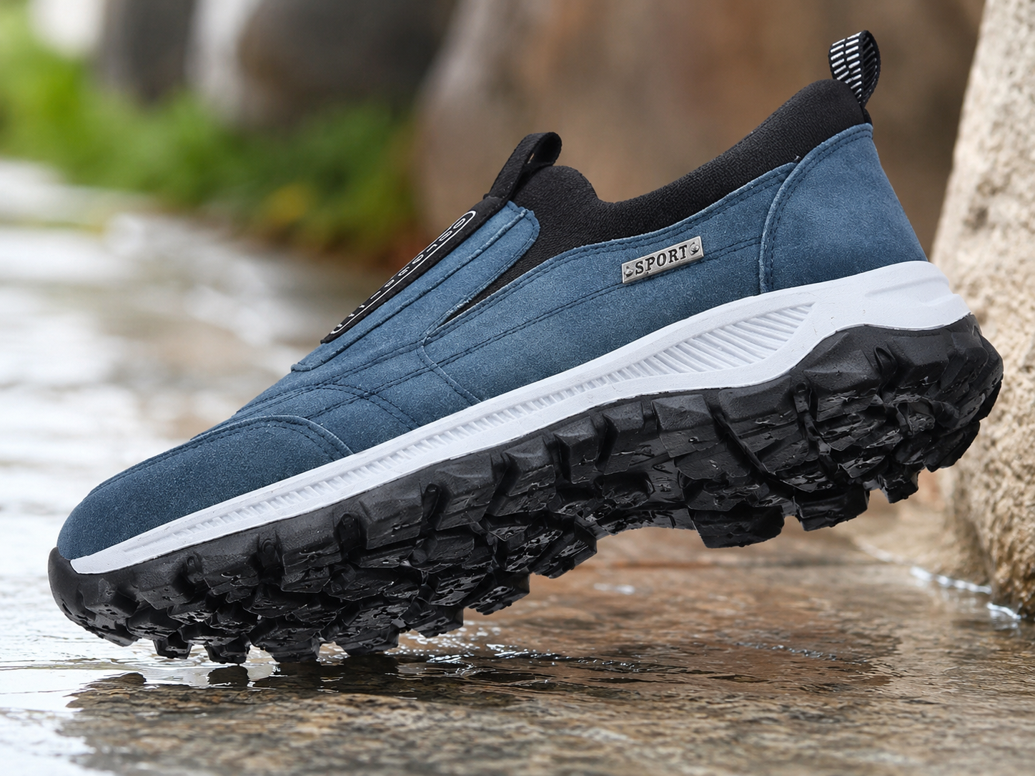 Suggested image: outsole tread close-up showing anti-slip grip pattern on wet pavement or tile