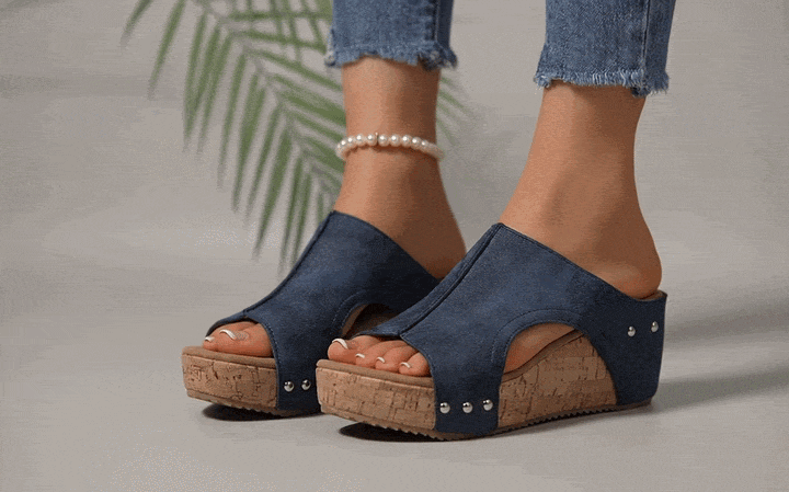 gif of a woman wearing flat sandals