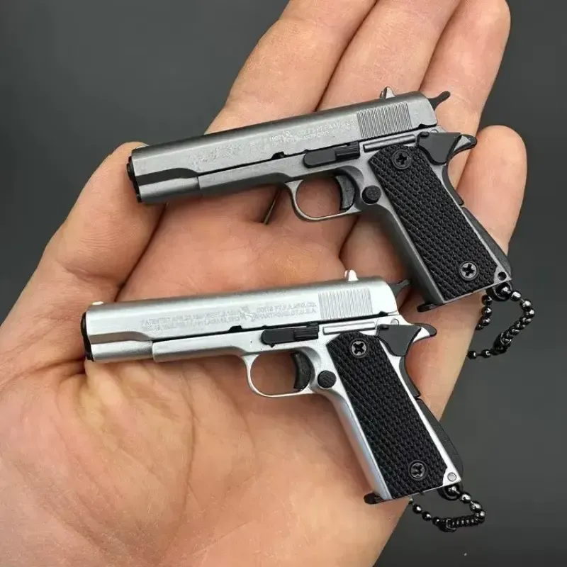 Mini Pistol Keychain - Exquisitely Detailed with Metallic Finish