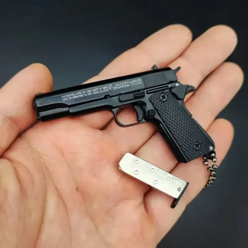 Mini Pistol Keychain - Exquisitely Detailed with Metallic Finish