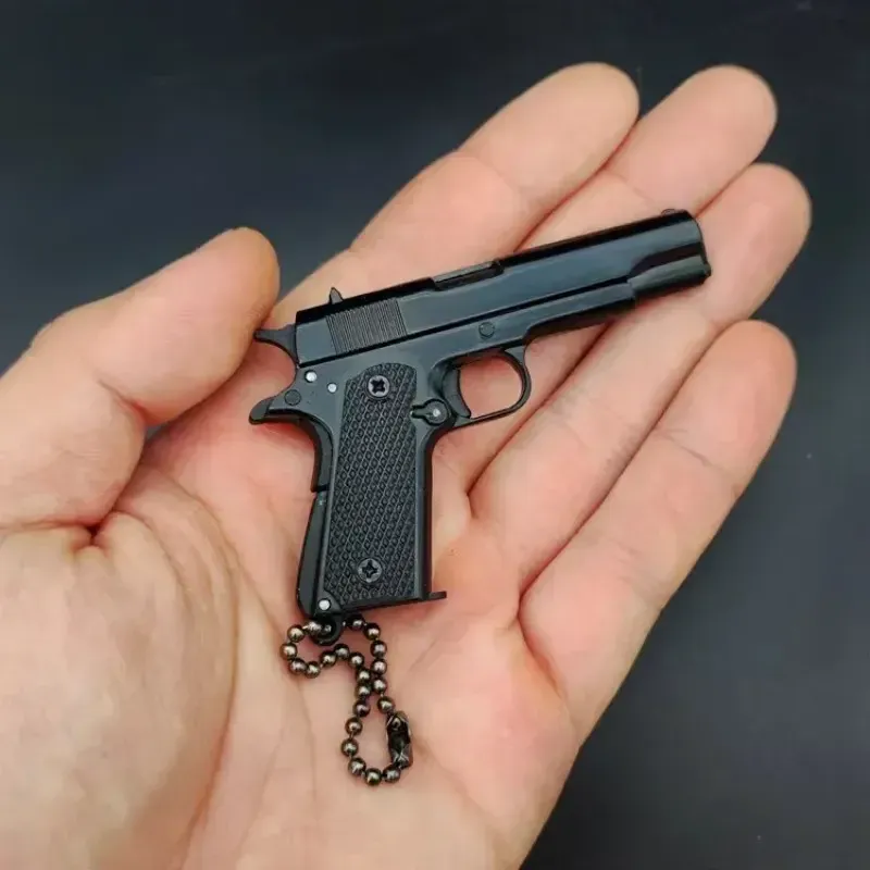 Mini Pistol Keychain - Exquisitely Detailed with Metallic Finish