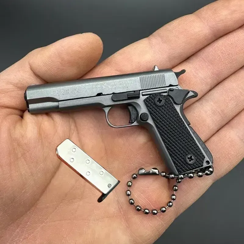 Mini Pistol Keychain - Exquisitely Detailed with Metallic Finish