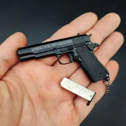 Mini Pistol Keychain - Exquisitely Detailed with Metallic Finish