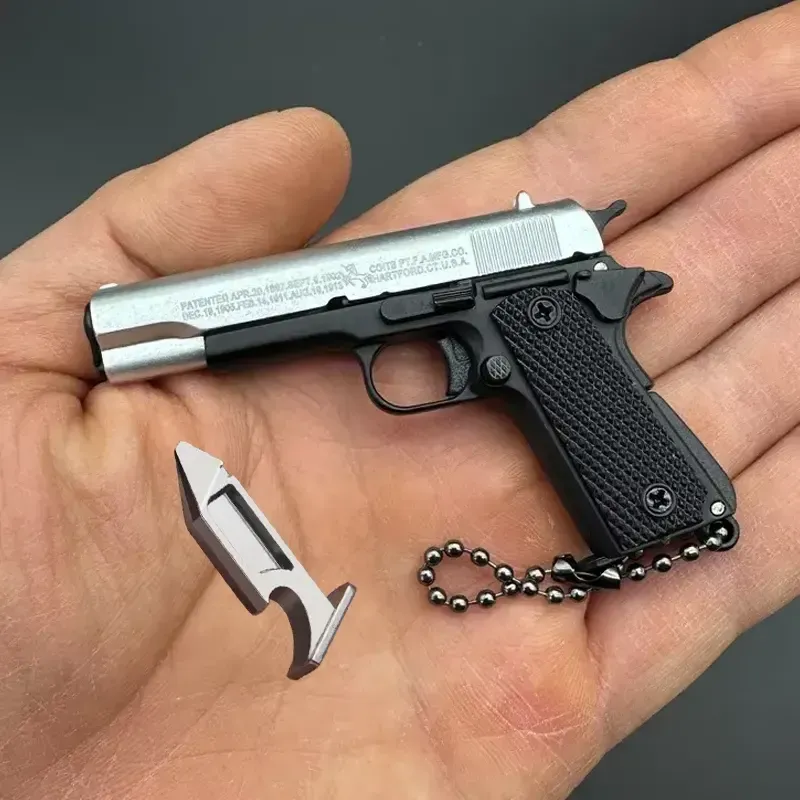 Mini Pistol Keychain - Exquisitely Detailed with Metallic Finish