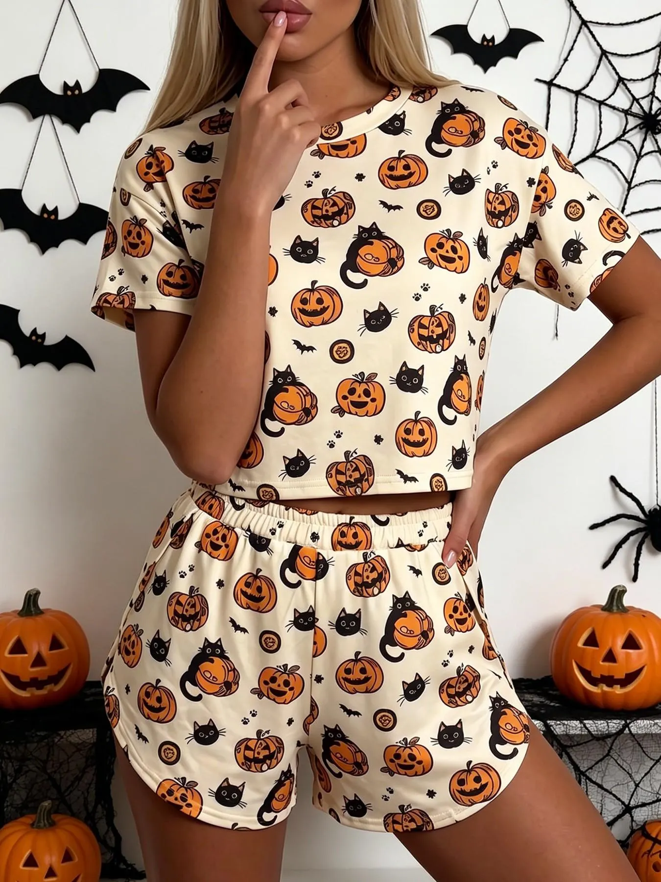 Halloween Summer 2-Piece Set with Pumpkin Ghost Print: Casual Loose Knit Short-Sleeve Top with Midriff Reveal and Side-Slit Shorts; Stylish loungewear, suitable for everyday wear, parties, and other occasions.