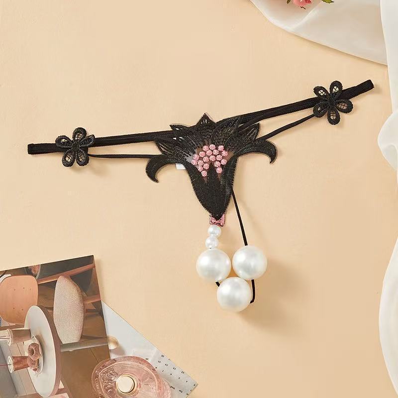 Oversized pearl detail crotchless thong