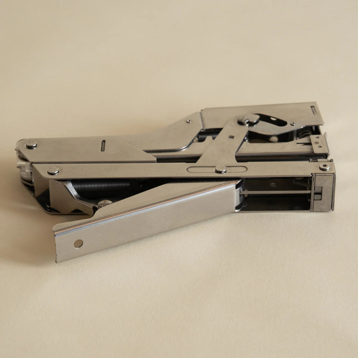 Portable and compact corner nail gun