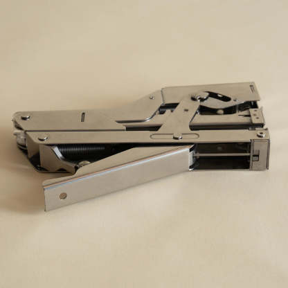 Portable and compact corner nail gun