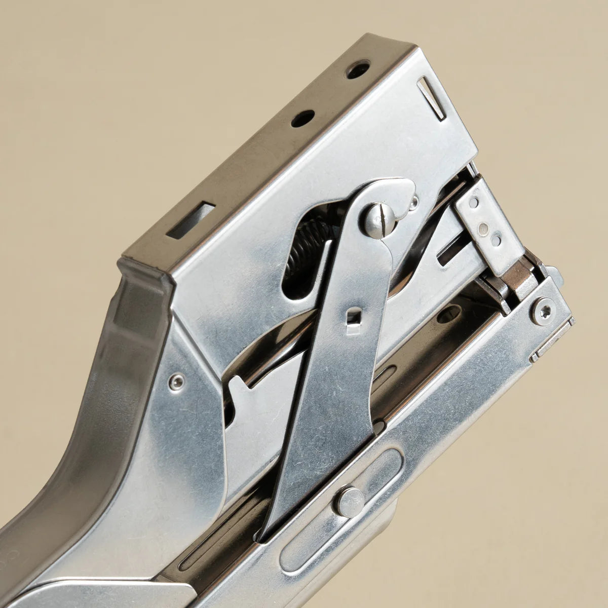 Portable and compact corner nail gun