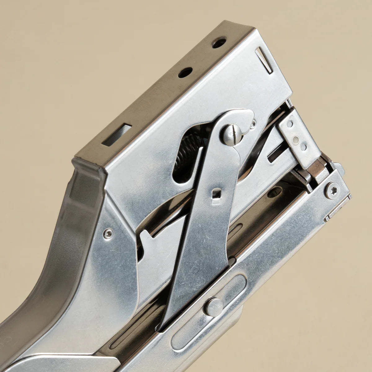 Portable and compact corner nail gun