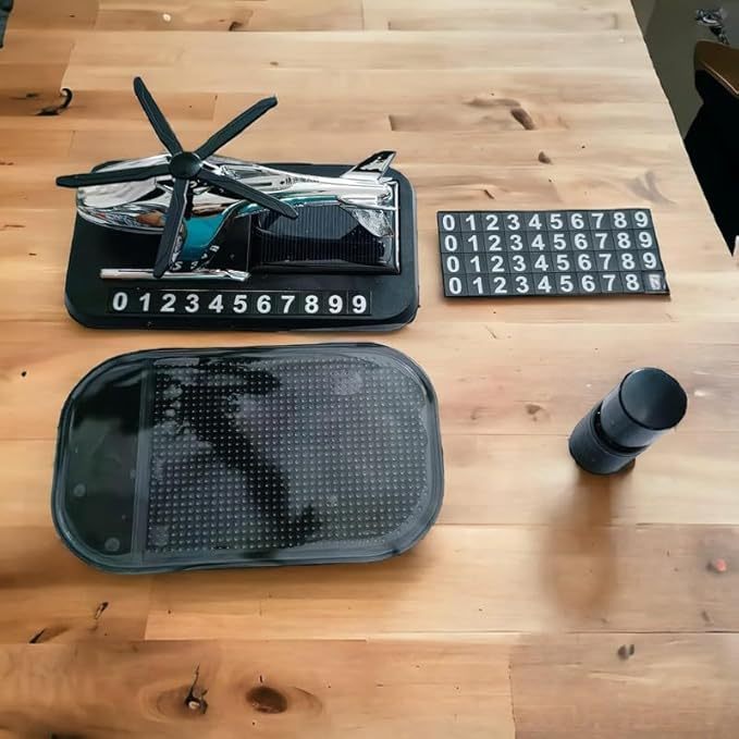 Car air freshener helicopter with solar charging and phone number function