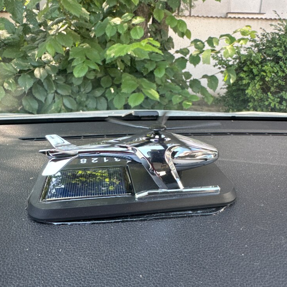 Car air freshener helicopter with solar charging and phone number function