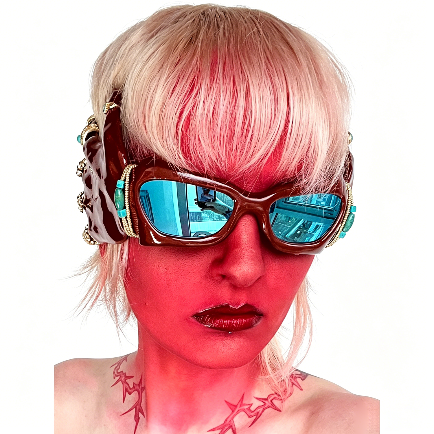 3D-printed red hand-shaped sunglasses