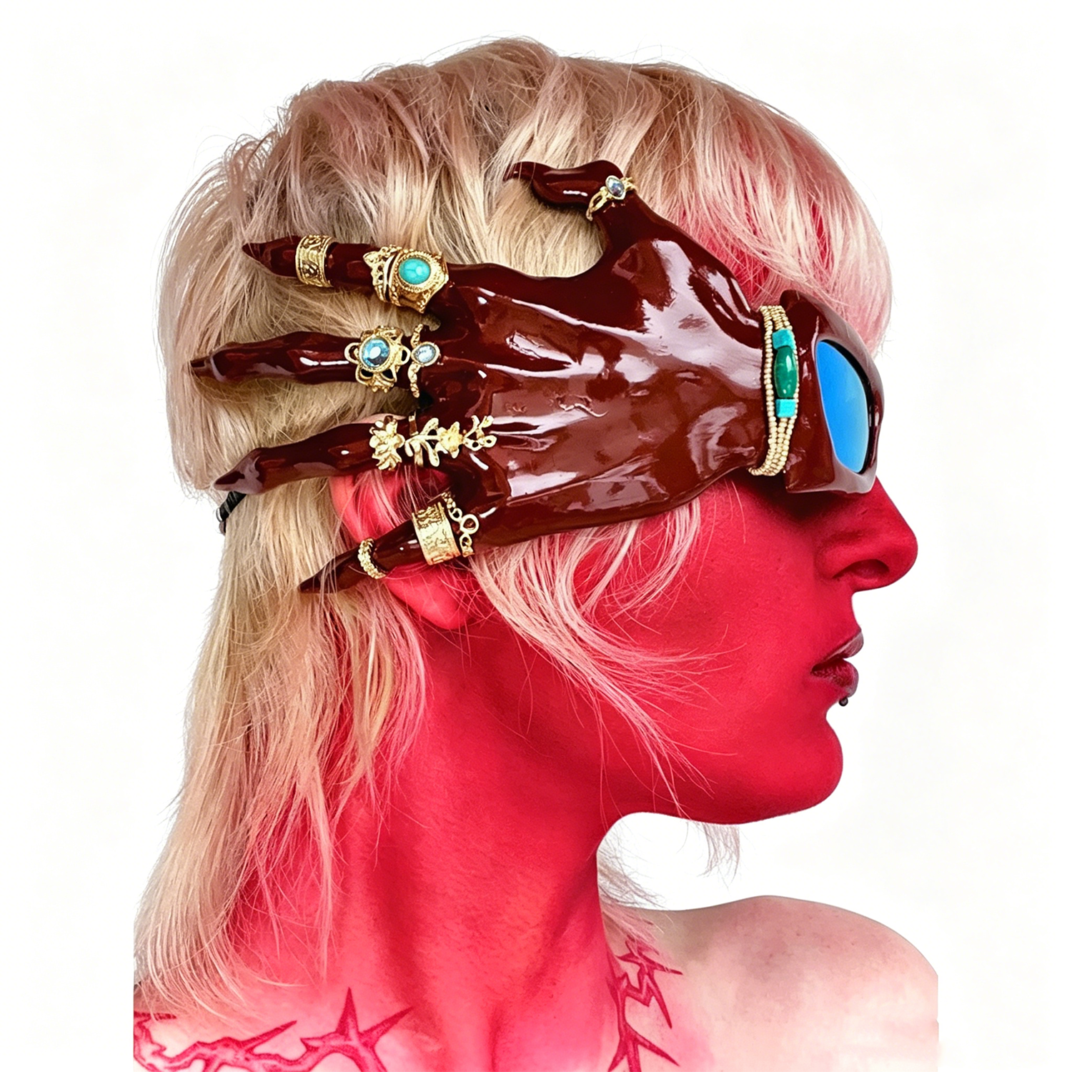 3D-printed red hand-shaped sunglasses