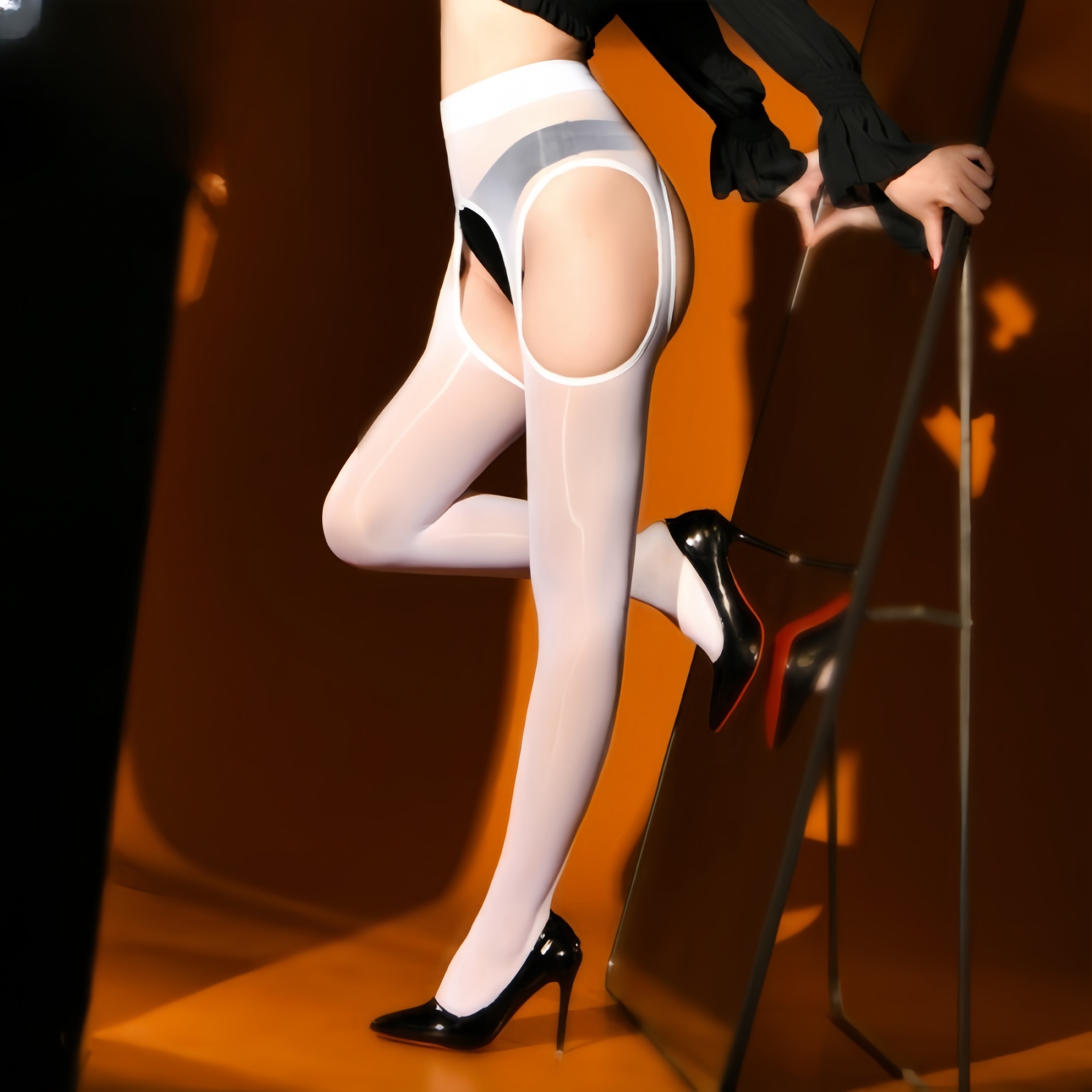 Long, shiny, snag-resistant, crotchless garter stockings