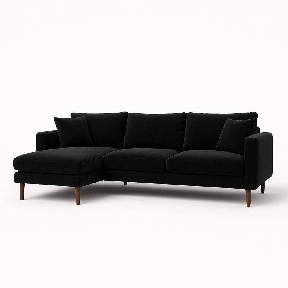 Svart hjørnesofa i fløyel med treføtter