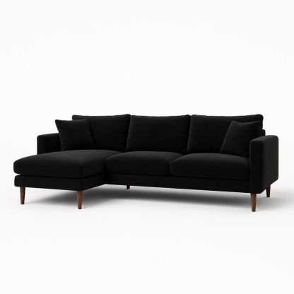Svart hjørnesofa i fløyel med treføtter