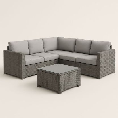 Hjørnesofa i metallramme og kunstrotting med grå puter