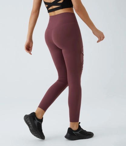 Fashion-forward cutout harness strap detail training leggings