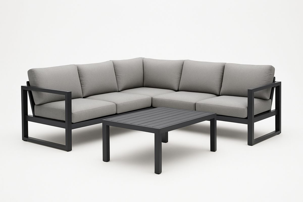 Hjørnesofa i aluminium med grå puter og bord i metall