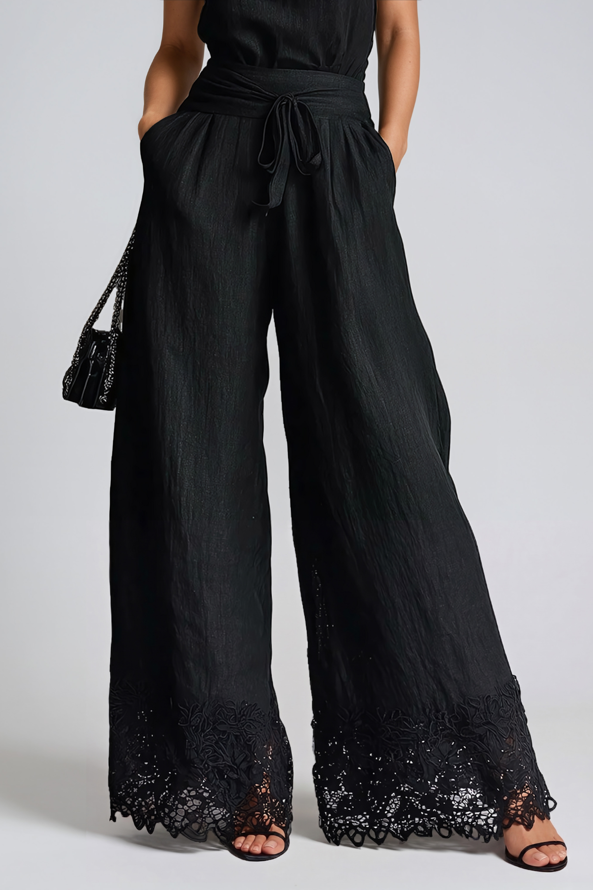 Hermolaos Sleeveless Lace Jumpsuit