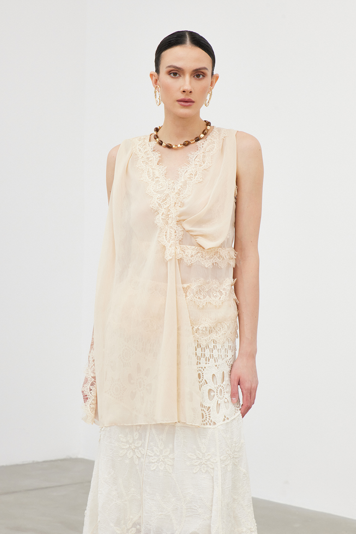 Ian Sleeveless Lace Draped Top
