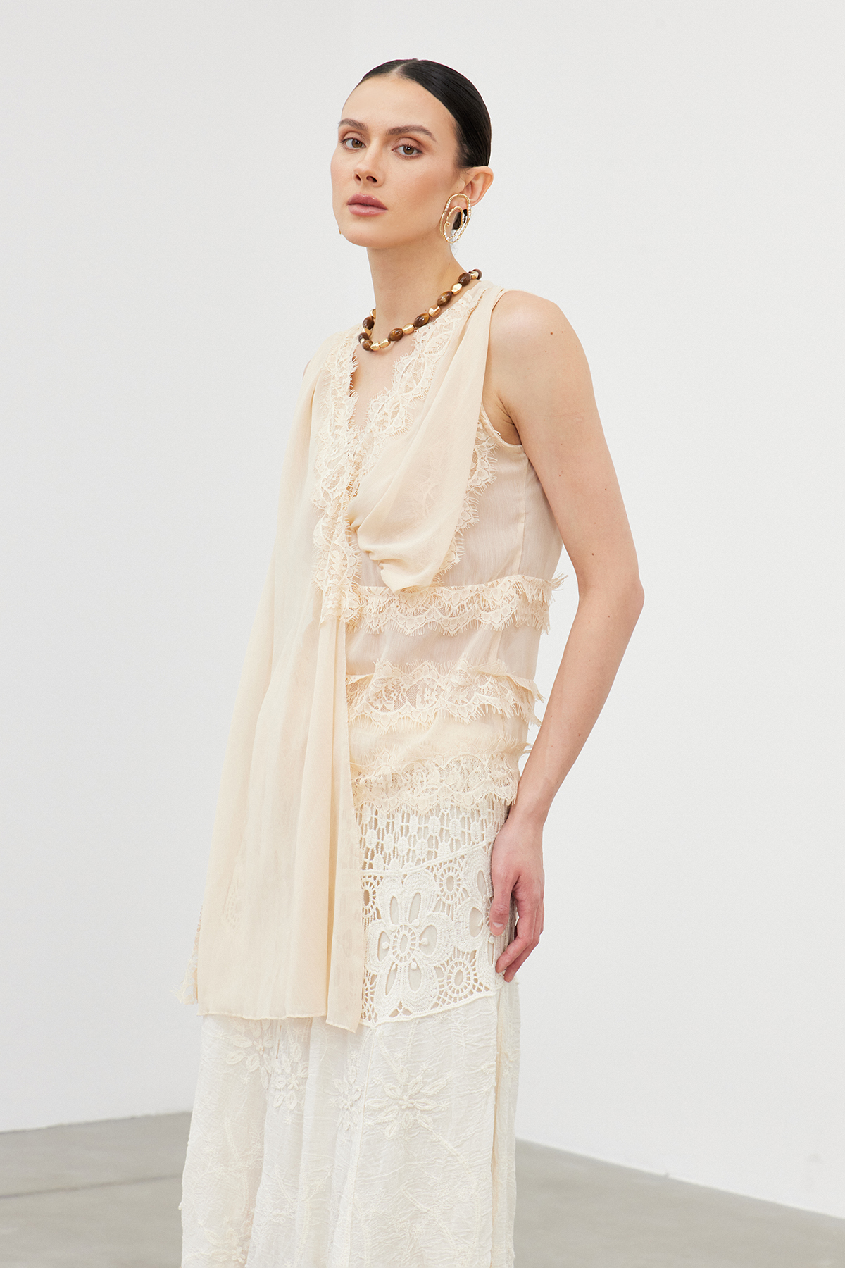 Ian Sleeveless Lace Draped Top