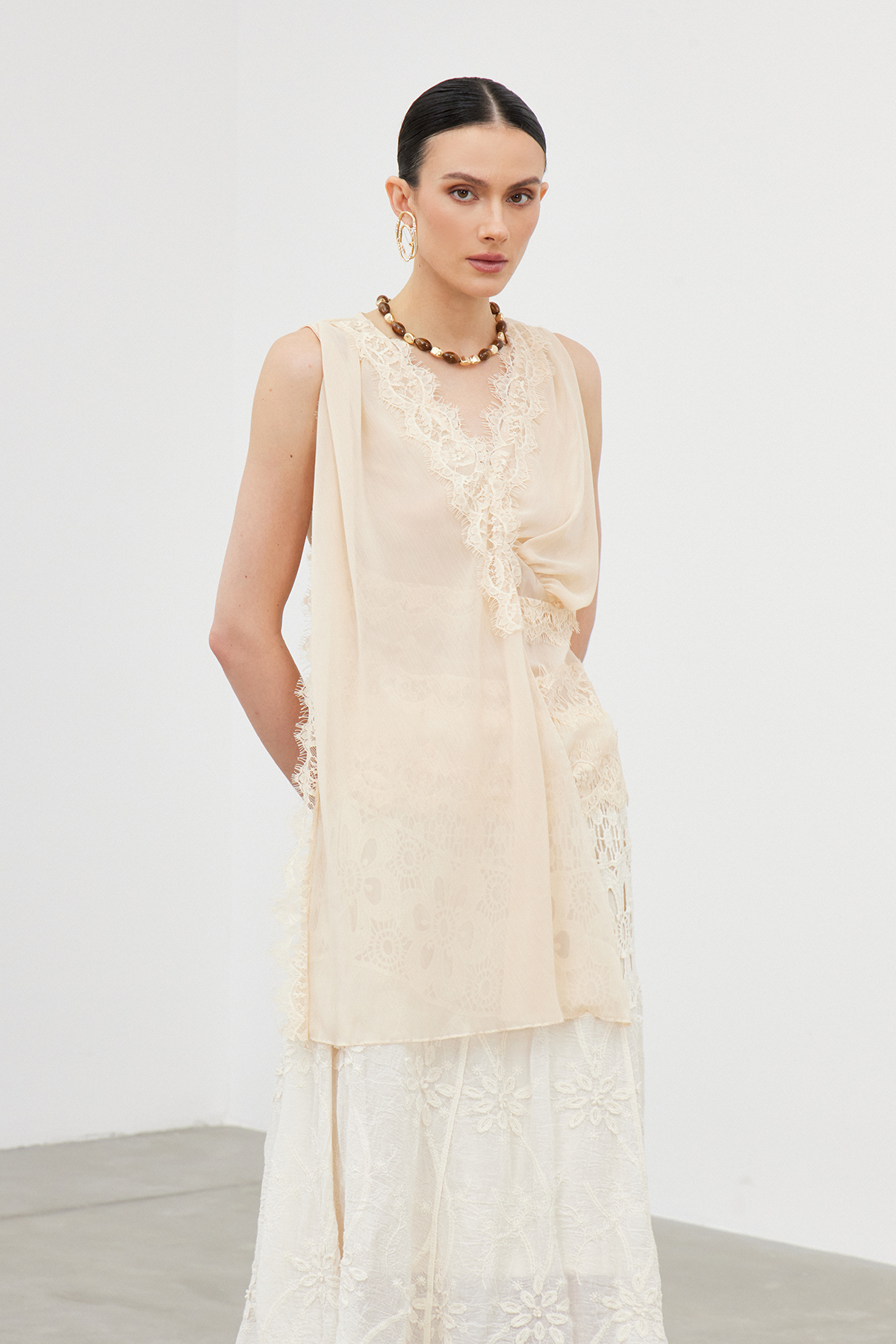 Ian Sleeveless Lace Draped Top