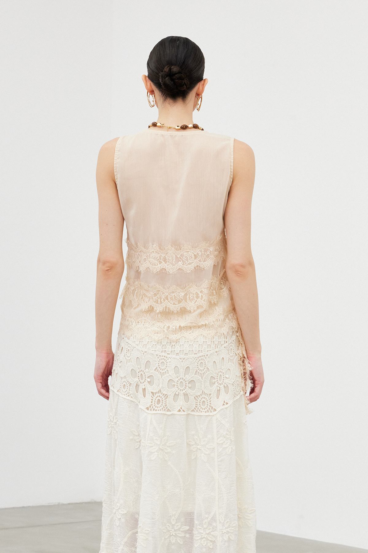 Ian Sleeveless Lace Draped Top