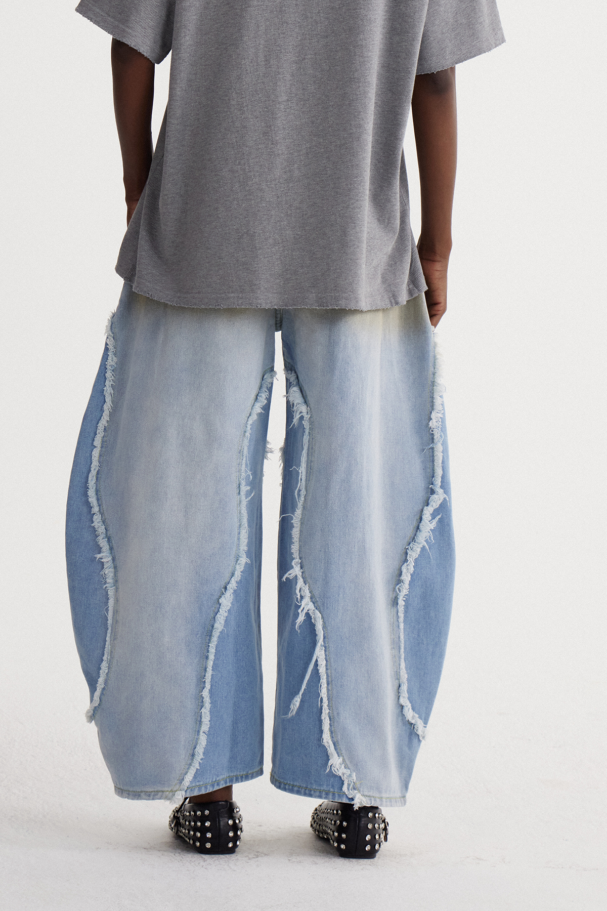 Isaiah Fringe Bleached Baggy Jeans