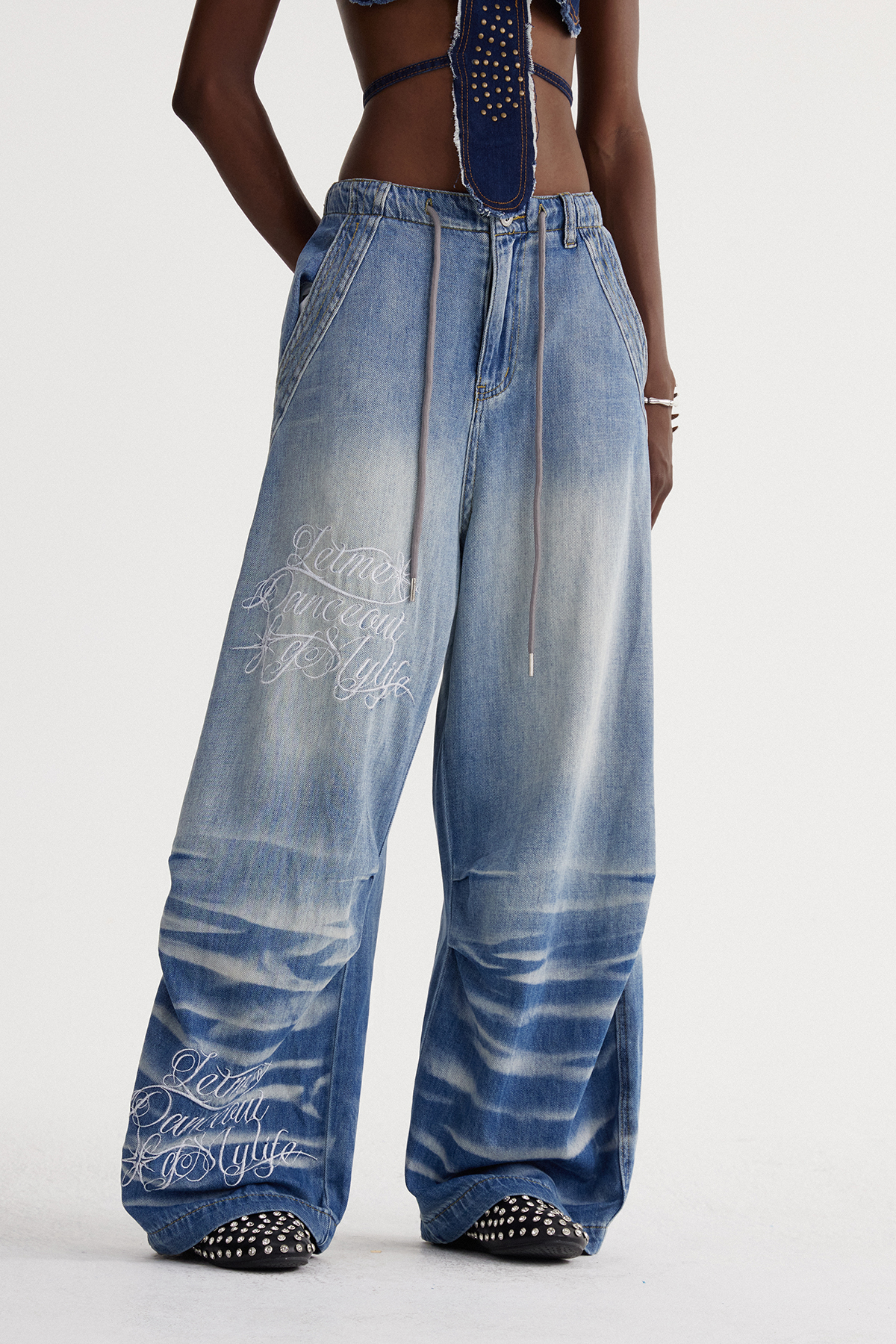 Isao Embroidered Bleached Baggy Jeans