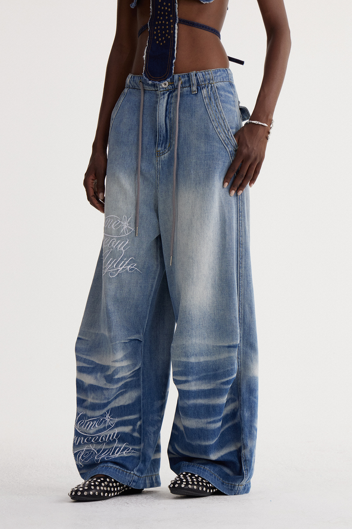Isao Embroidered Bleached Baggy Jeans