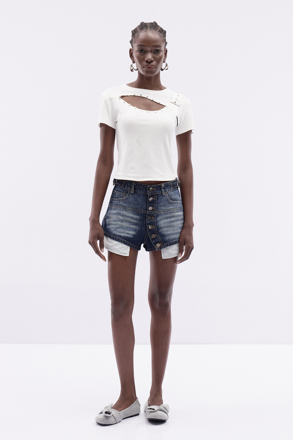 Itimad Asymmetric Button Denim Shorts
